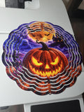 Halloween wind spinner with glowing jack-o-lantern, ghost, haunted mansion and full moon on purple night sky