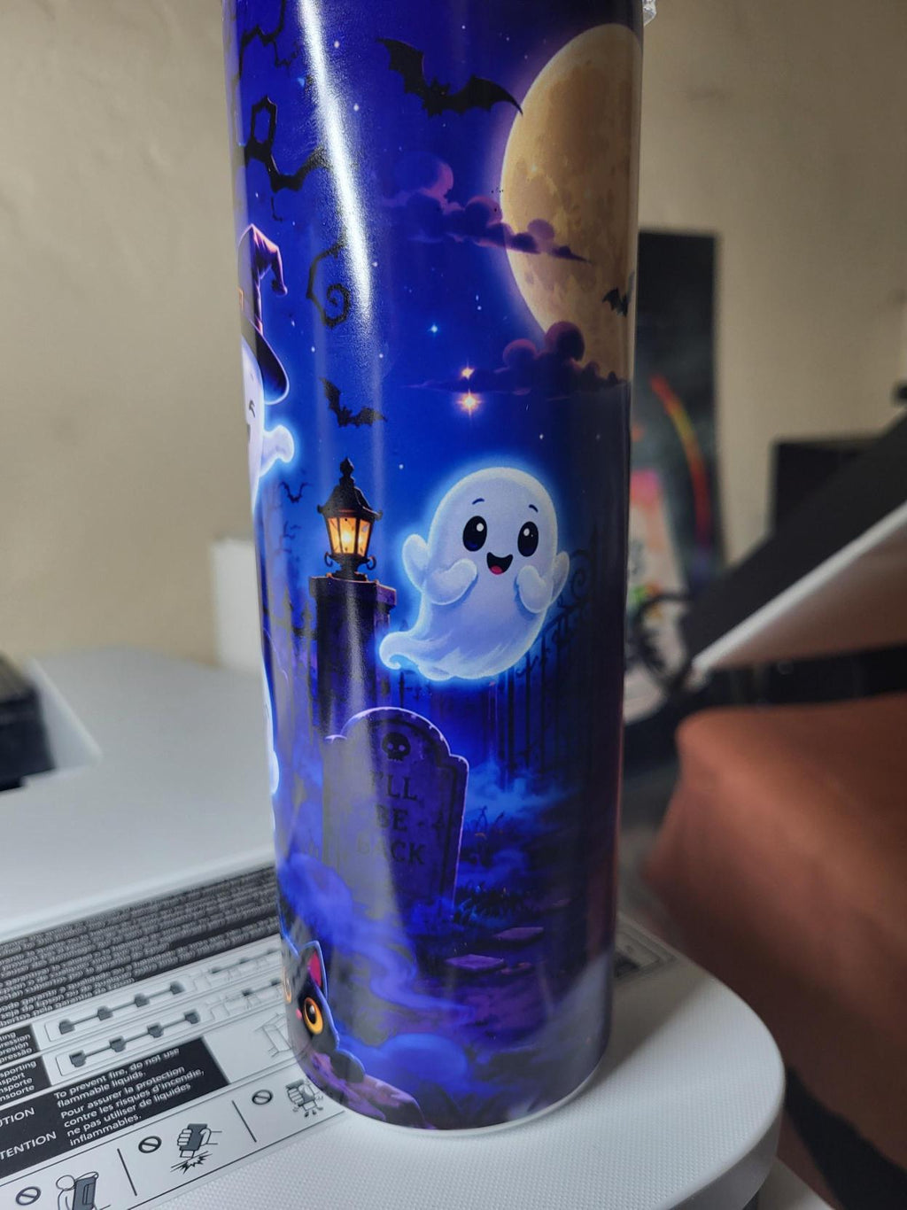 Halloween ghost tumbler fourth angle with cute ghosts and black cat near pumpkins