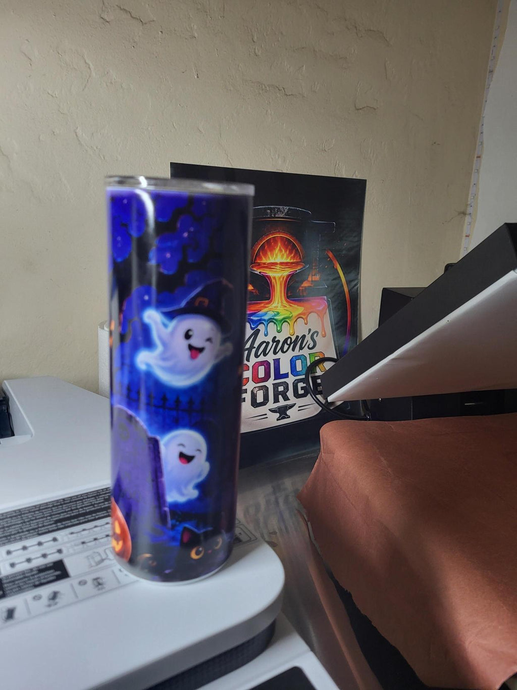 Halloween ghost tumbler back view with ghost by lantern post and graveyard tombstones under full moon