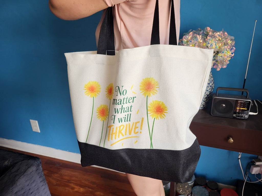 Tote bag with The Audacity tarot card design, flat lay