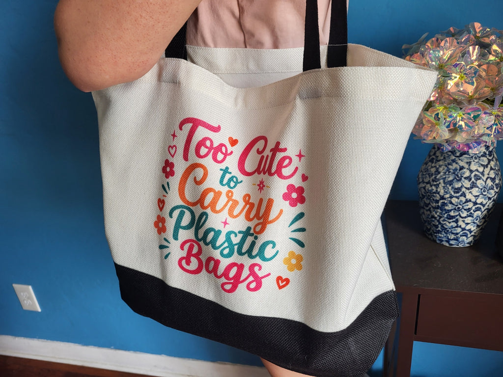 Tote bag with The Audacity tarot card design, held by model