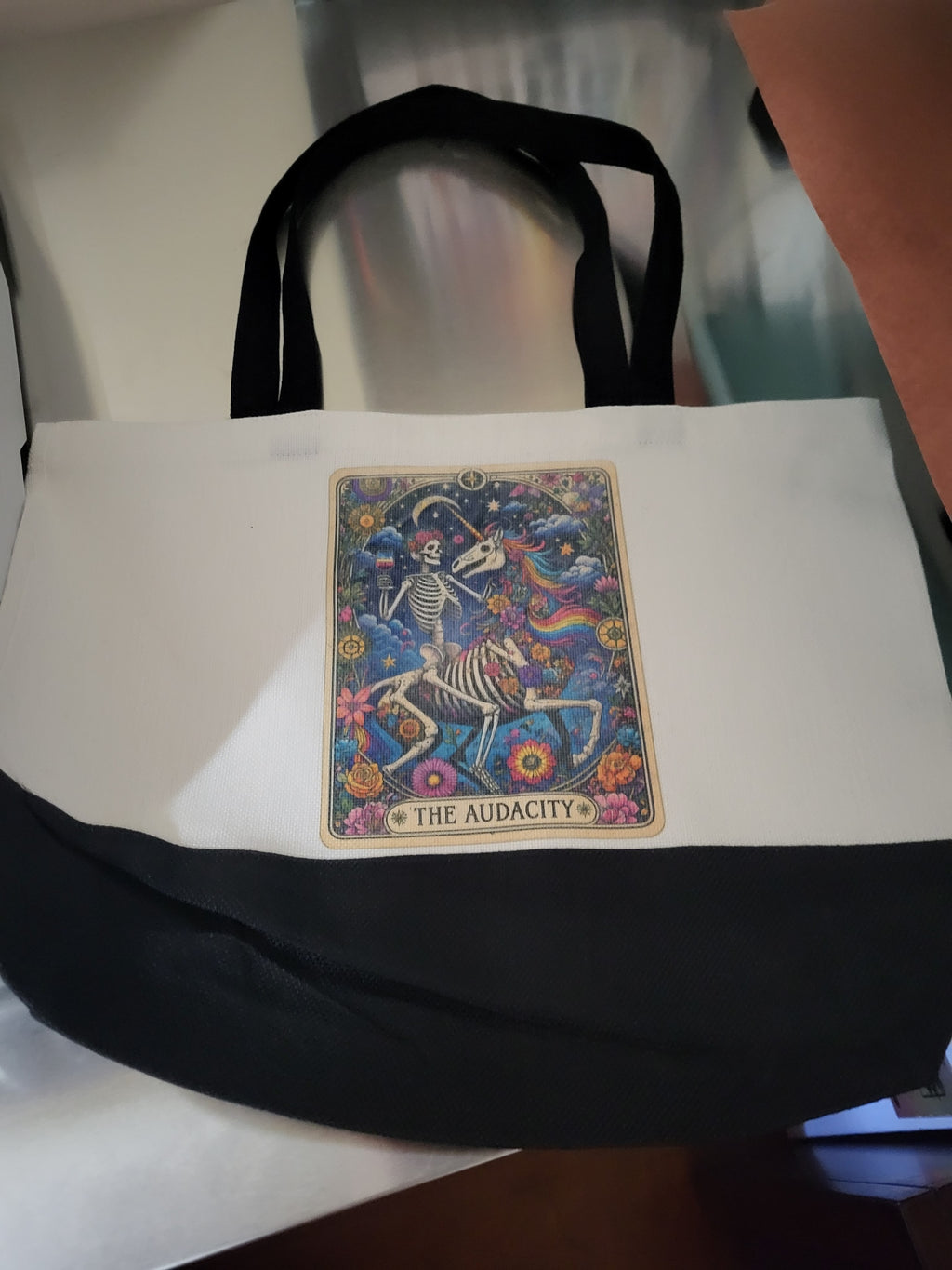 Tote bag with dandelion design, flat lay